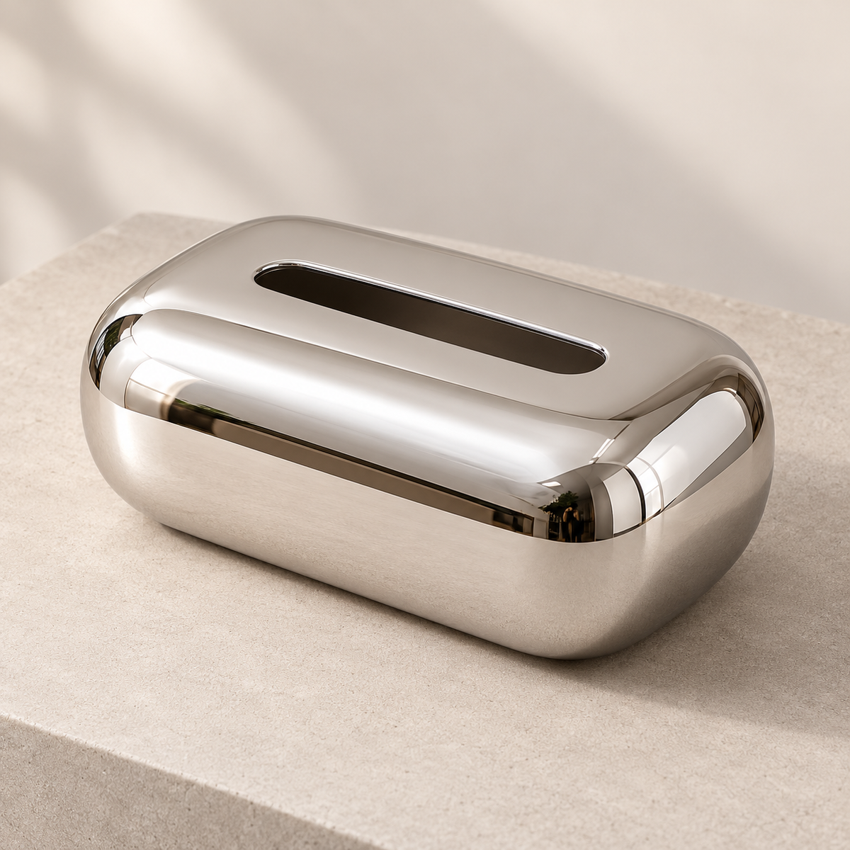 Mirror Silver Tissue Box Cover with a Reflective Finish and Smooth Rounded Silhouette